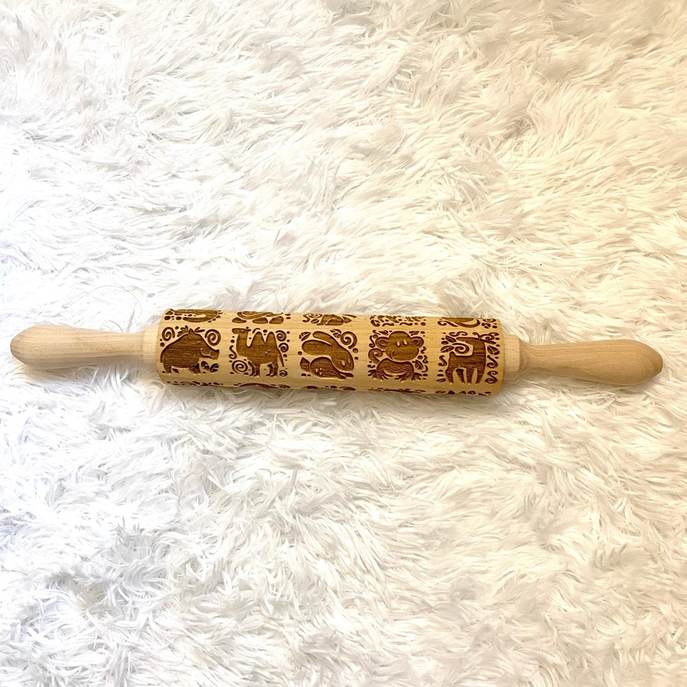 NWOT Embossed animal rolling pin